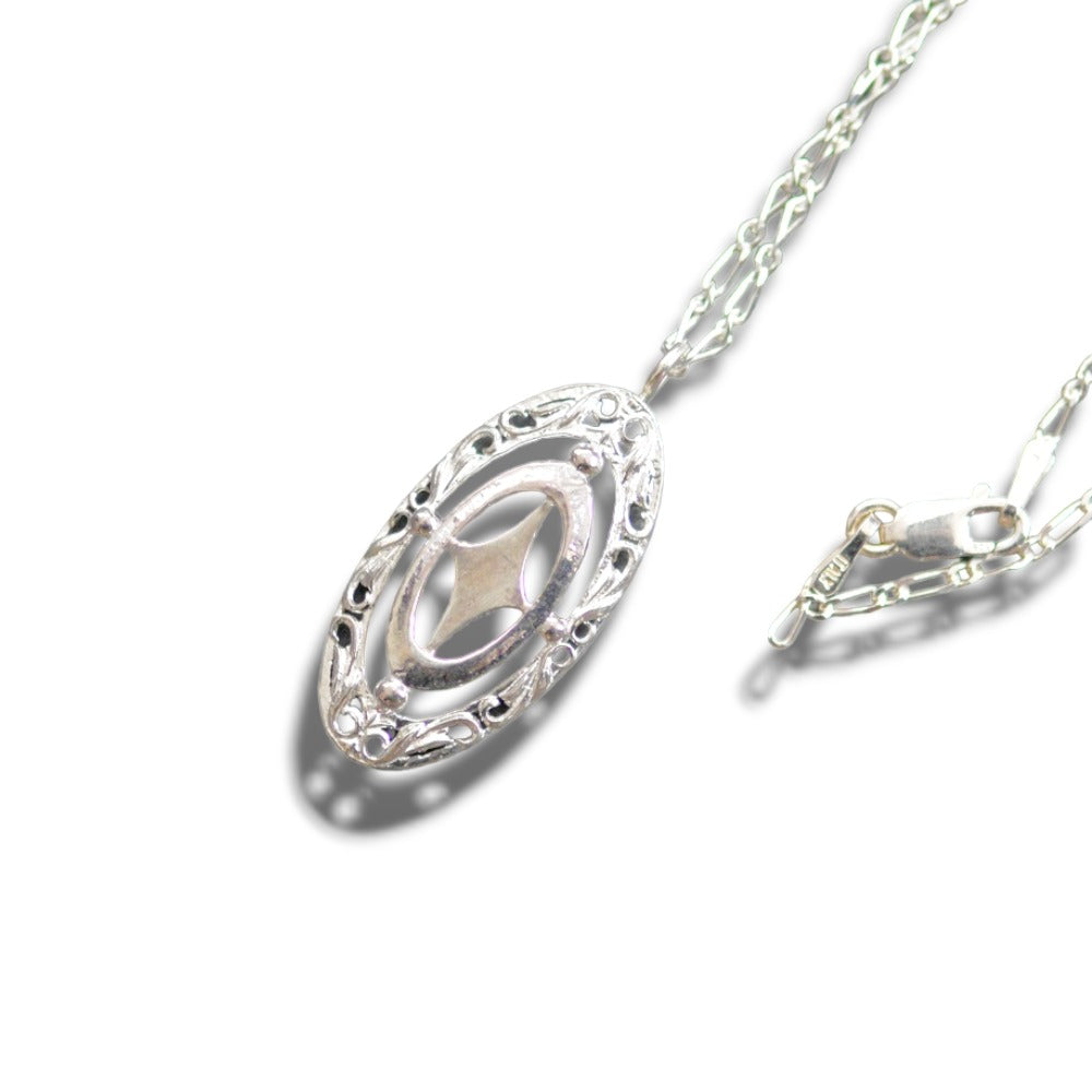 IMULTAの彫金ジュエリー gap shield ネックレス