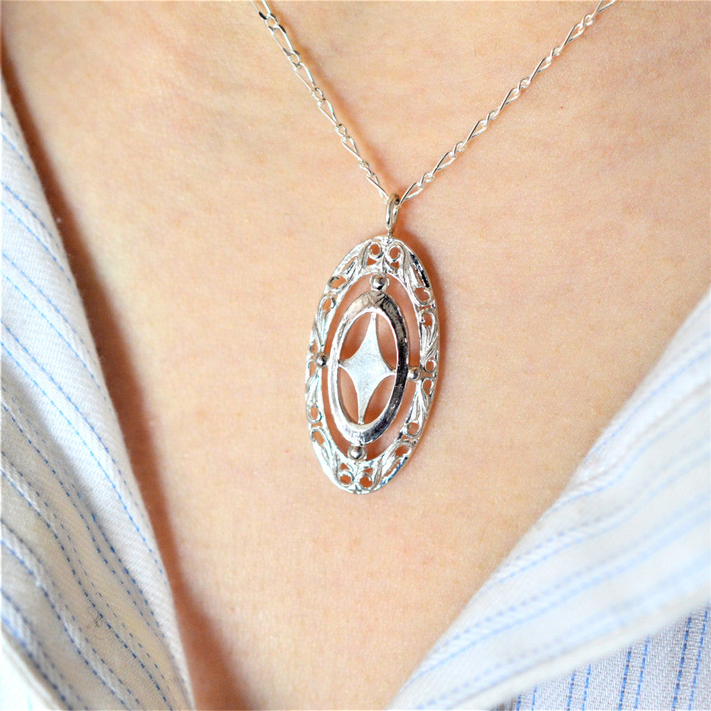 IMULTAの彫金ジュエリー gap shield ネックレス