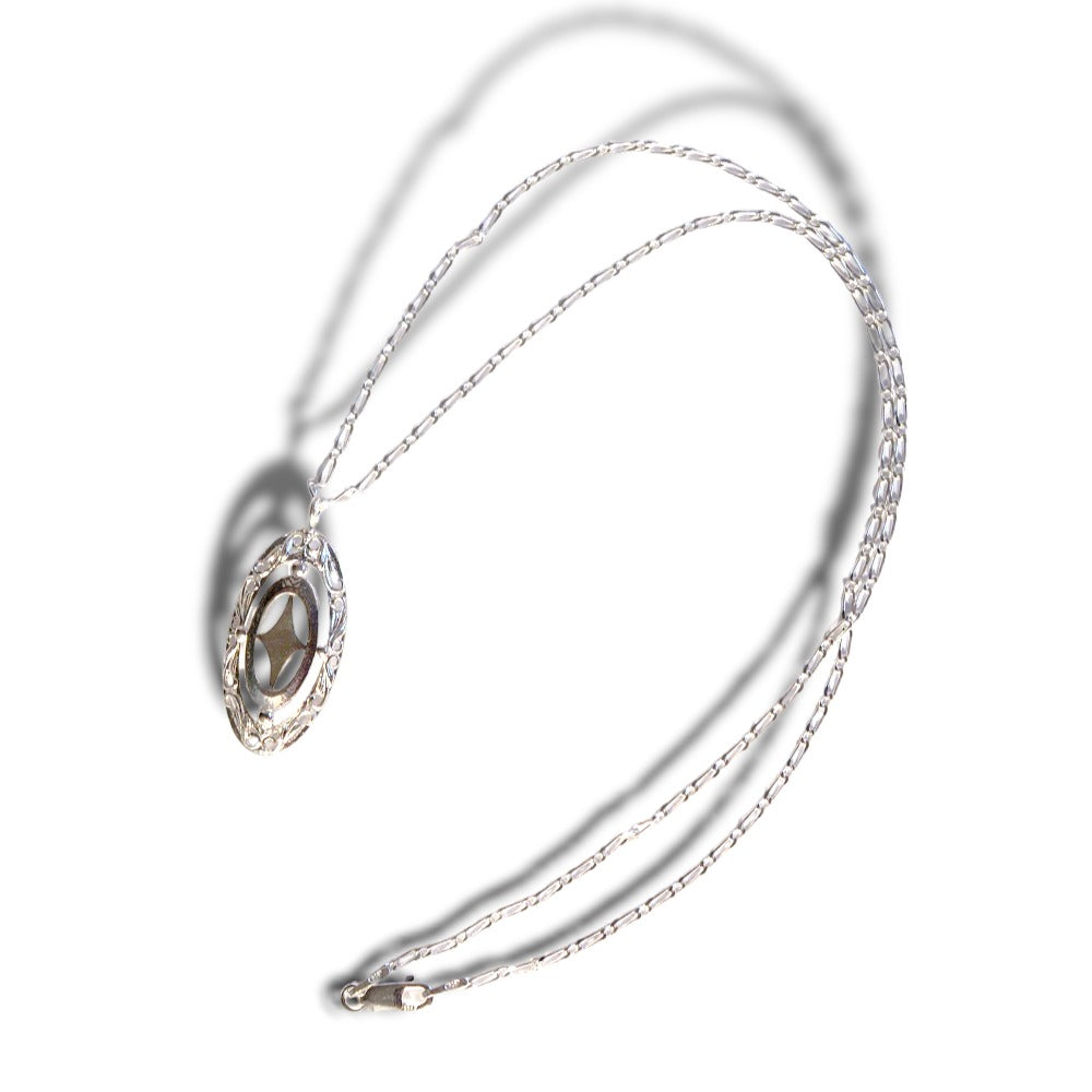 IMULTAの彫金ジュエリー　gap shield　ネックレス